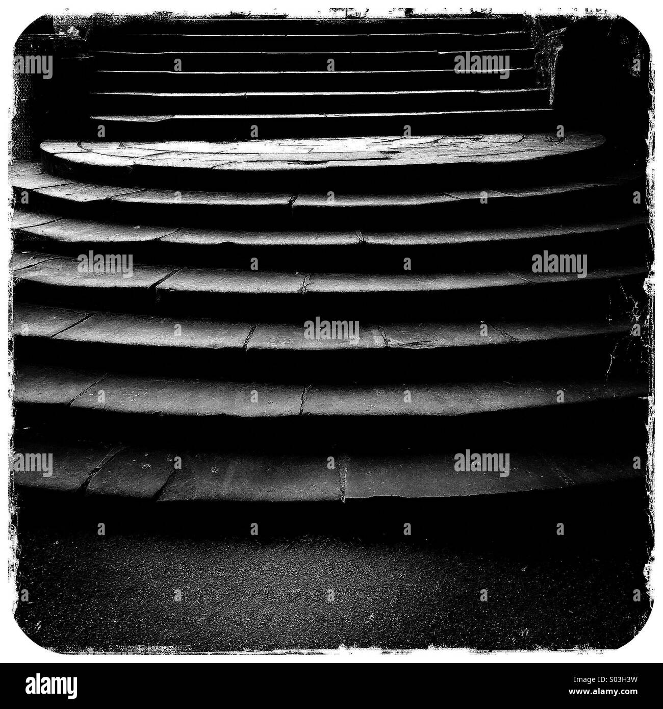 Light and shadow on curved stone steps - Smartphone Captured Stock Image