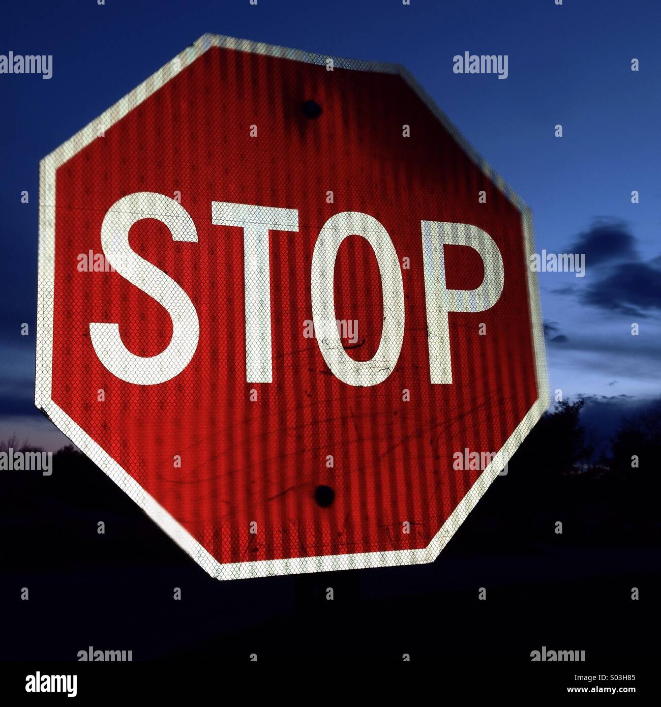Stop sign at night - Smartphone Captured Stock Image