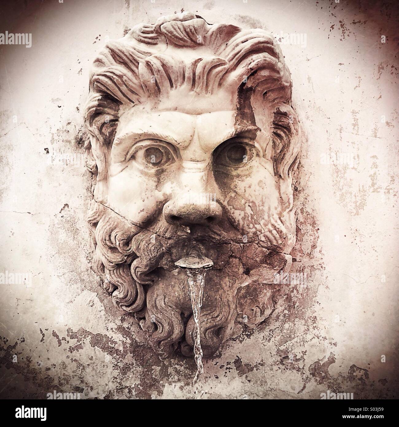 Ancient Roman sculpture of a head as part of a fountain, Rome Italy Stock Photo Alamy