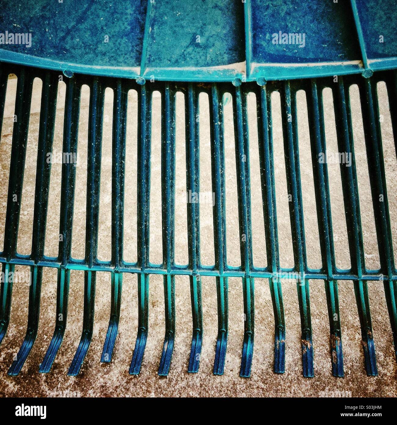 Abstract of green garden and lawn  rake. - Smartphone Captured Stock Image