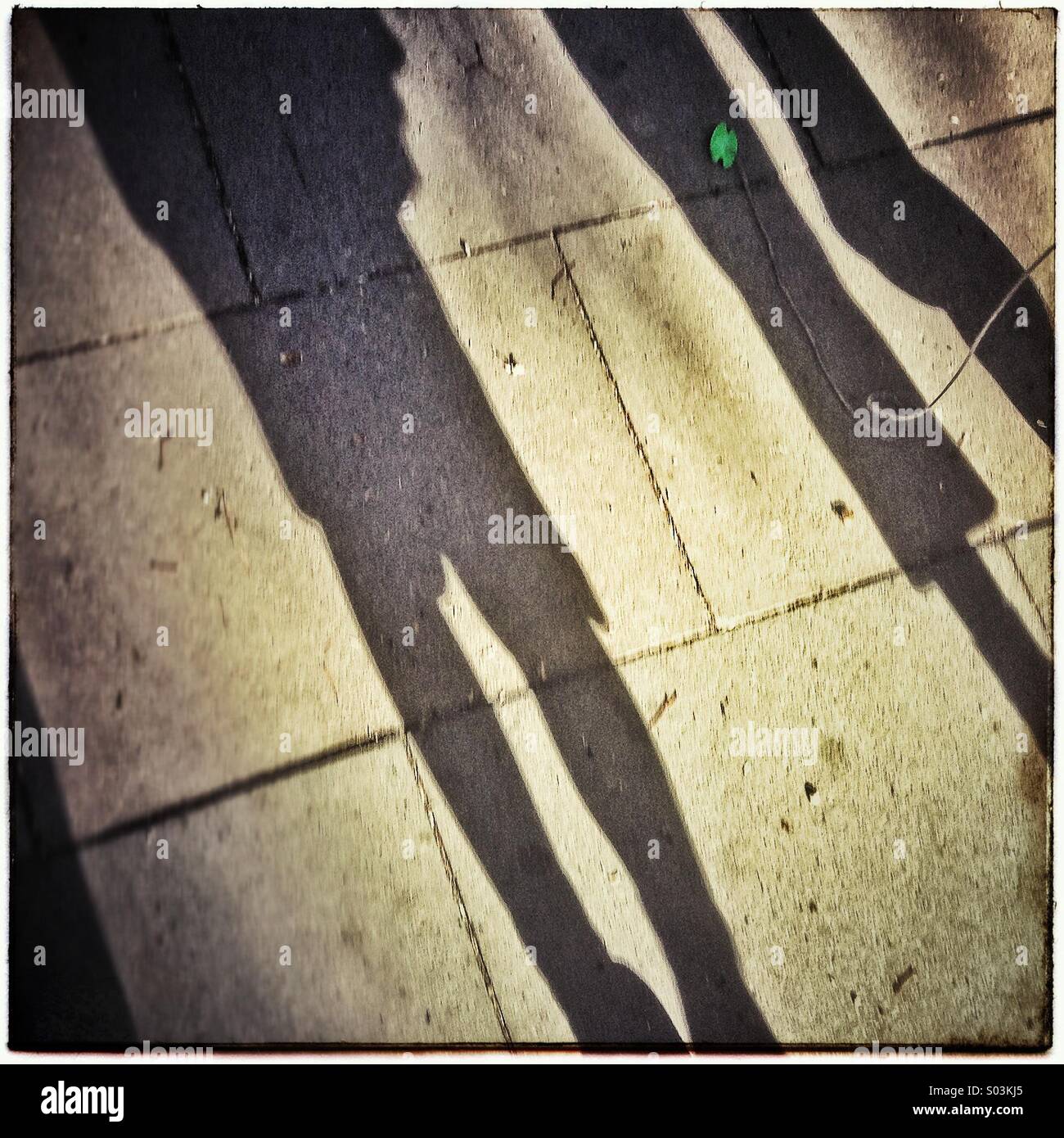 Two human shadows on the street - Smartphone Captured Stock Image