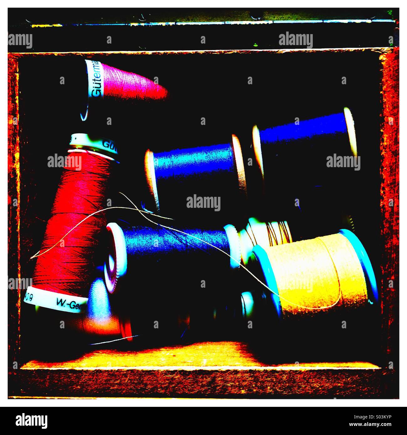 Cotton reels in wooden sewing box Stock Photo Alamy