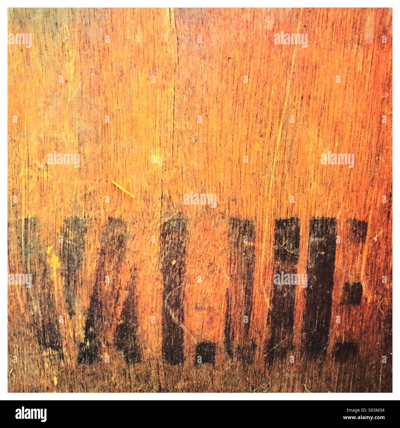 Value written on side of old wooden tea chest - Smartphone Captured Stock Image