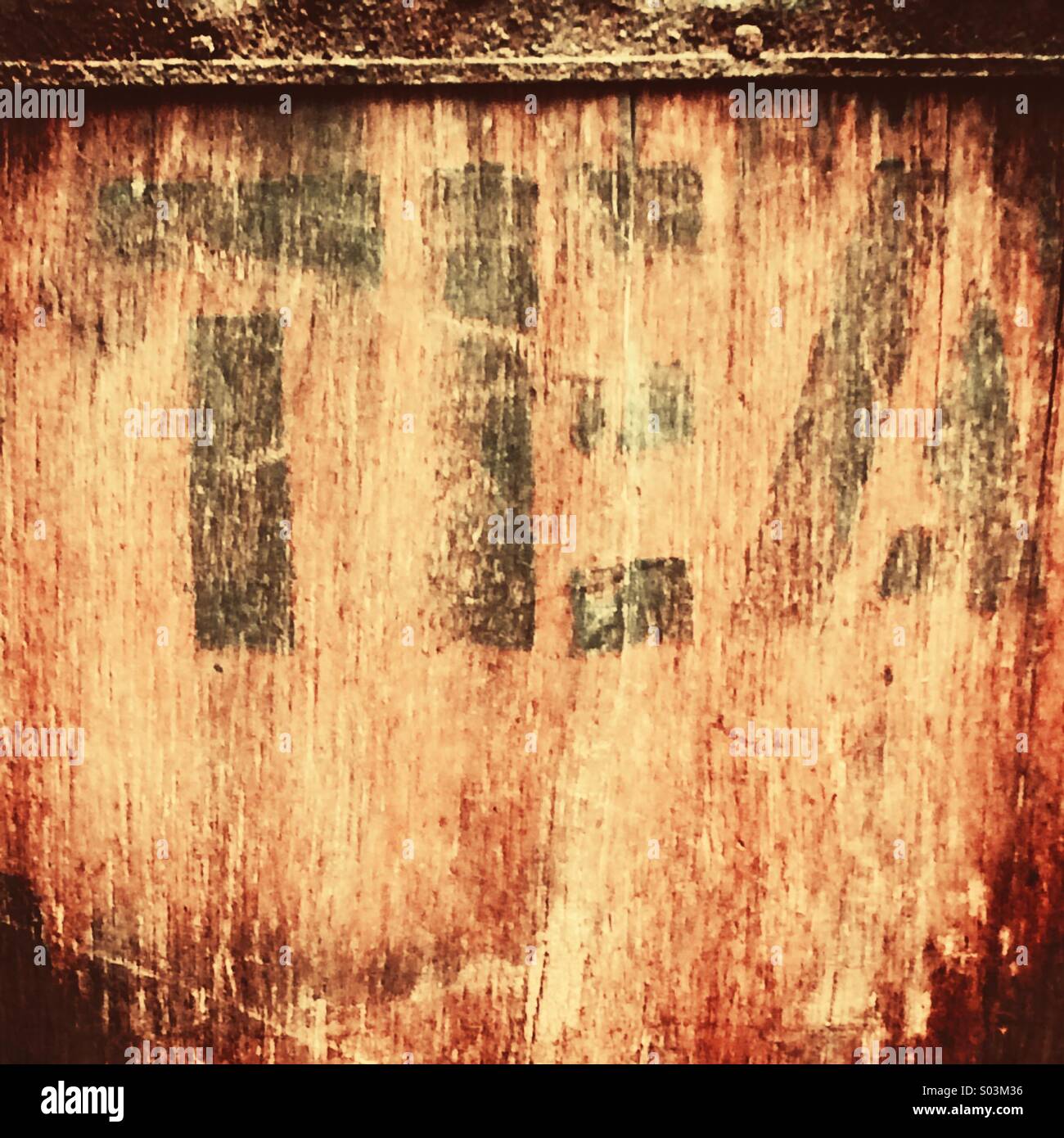 Tea written on side of an old wooden tea chest - Smartphone Captured Stock Image