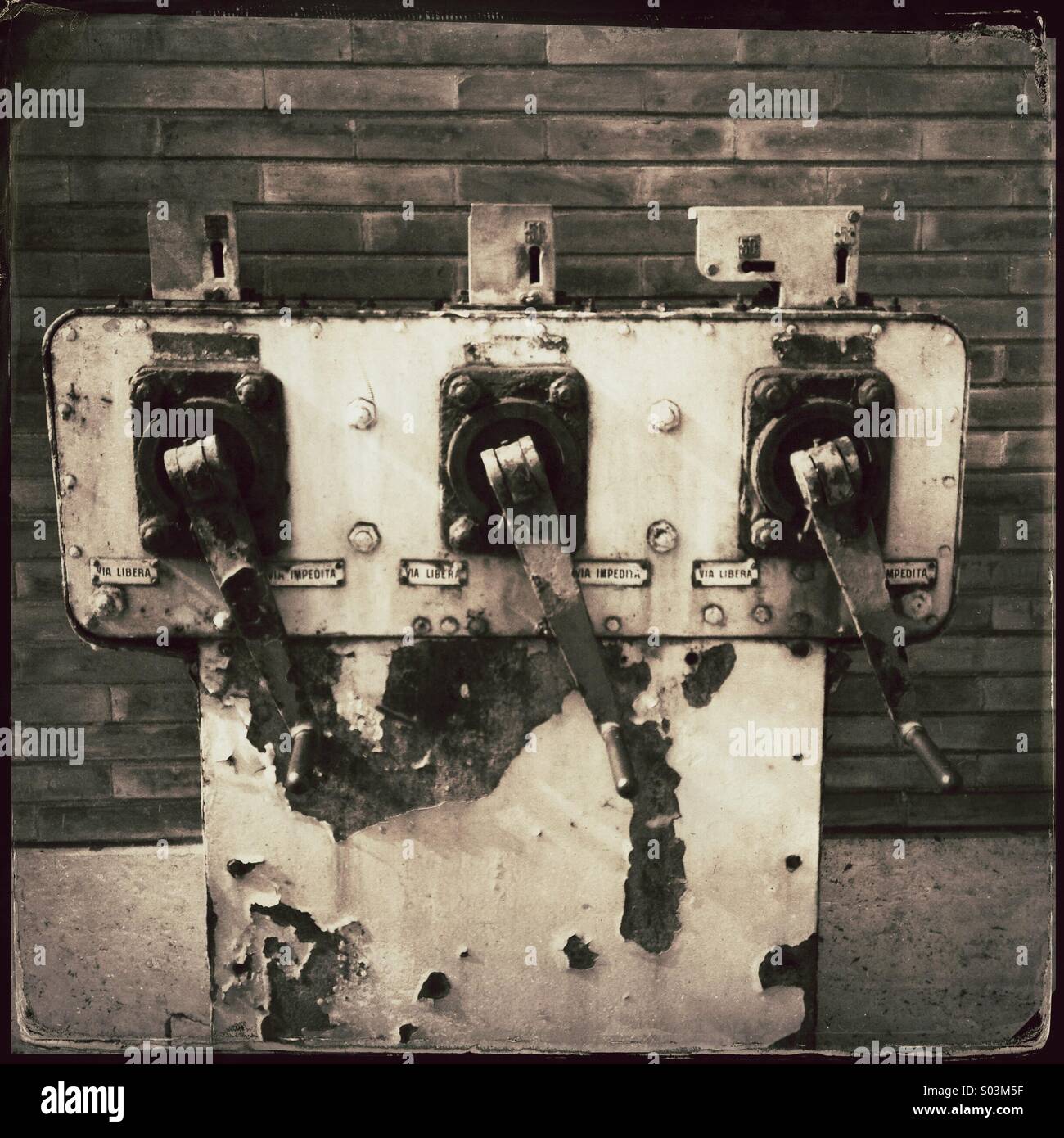 Antique train station detail: winch for the actuation of the bus bars of the level crossing - Smartphone Captured Stock Image