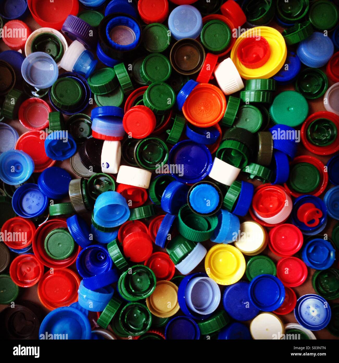 Colorful plastic lids for recycling Stock Photo