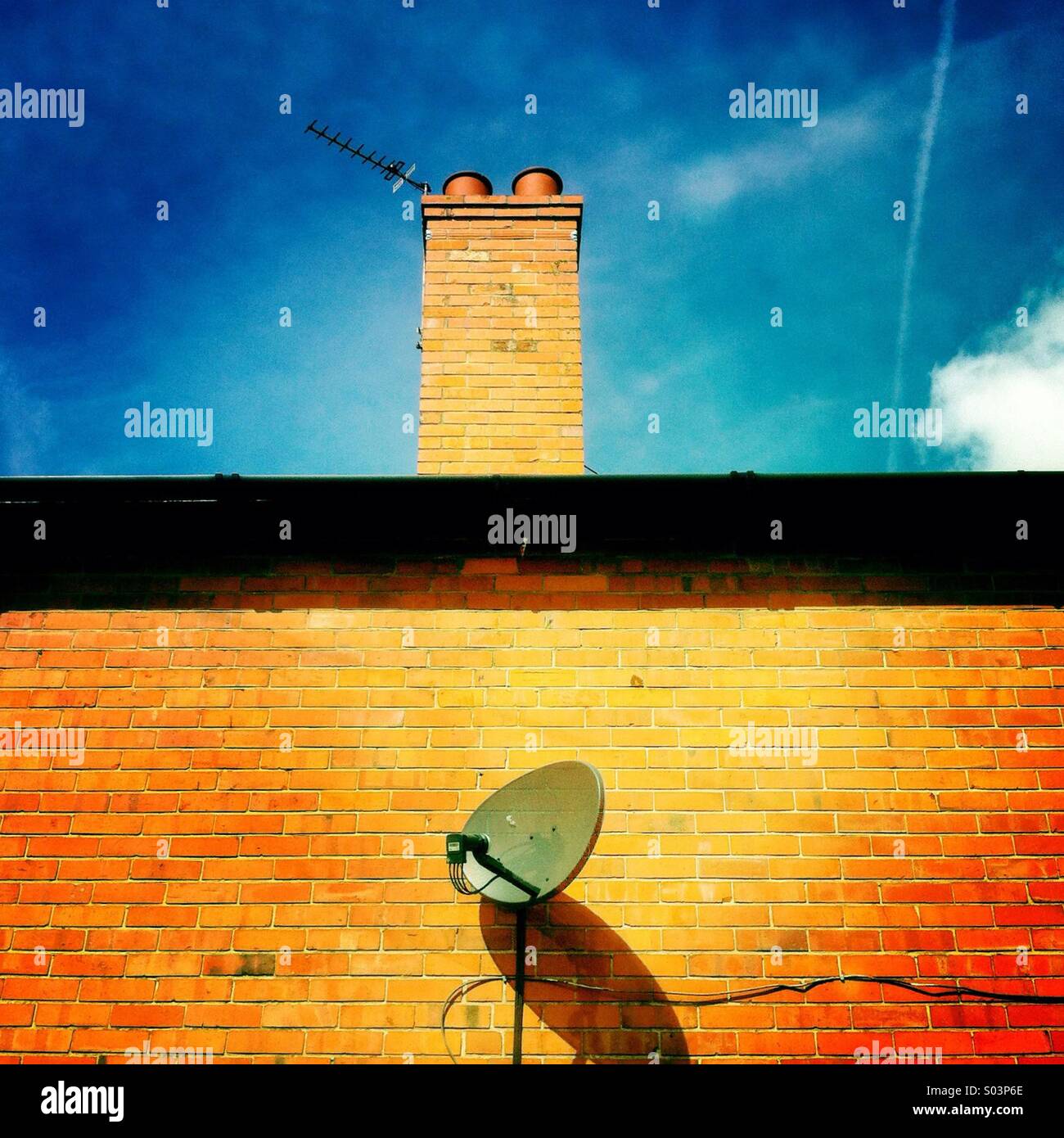 House with satellite dish on side Stock Photo Alamy