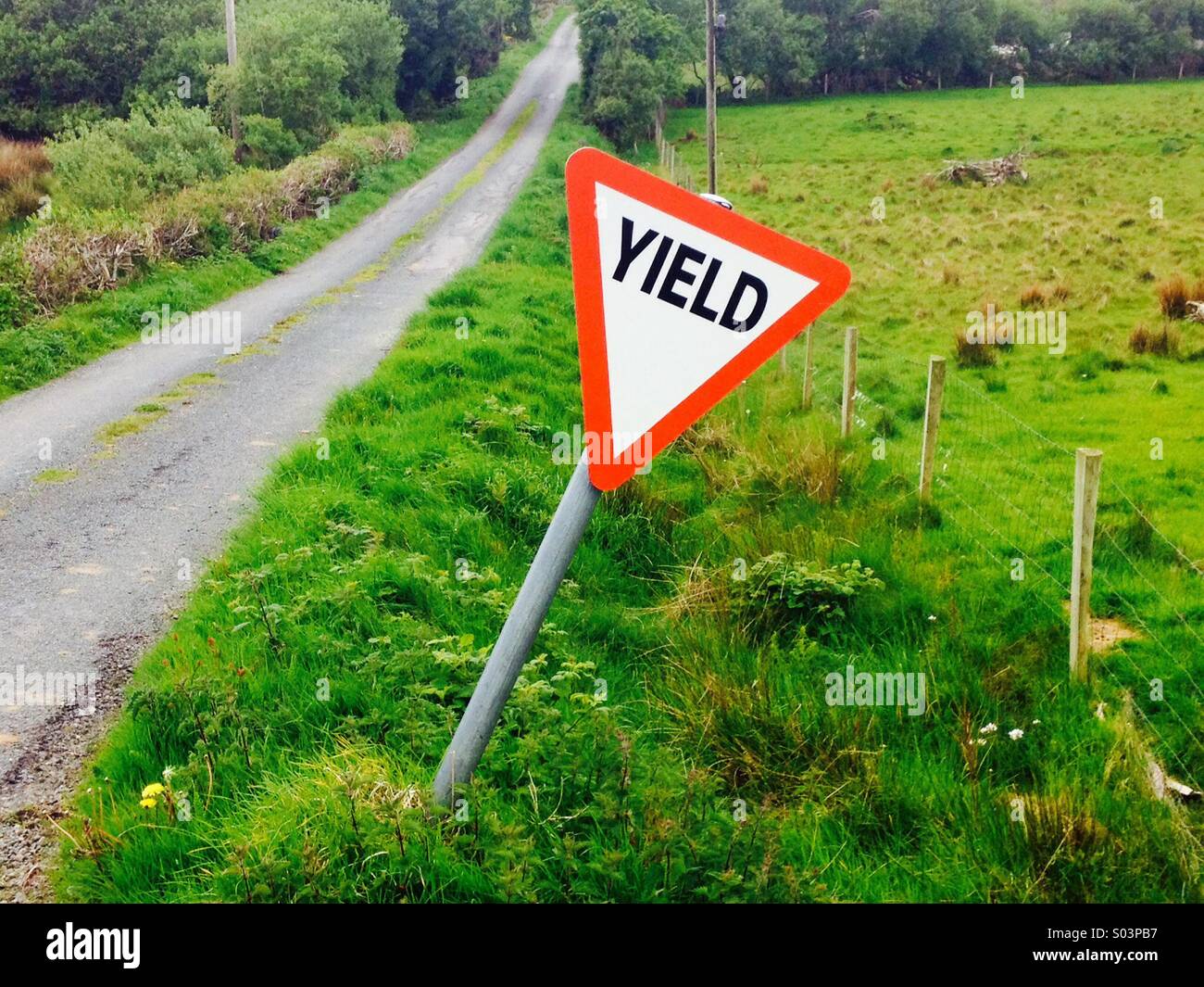 Yield Or Stop Sign In Rural Ireland Financial Meaning Too Stock Photo Alamy
