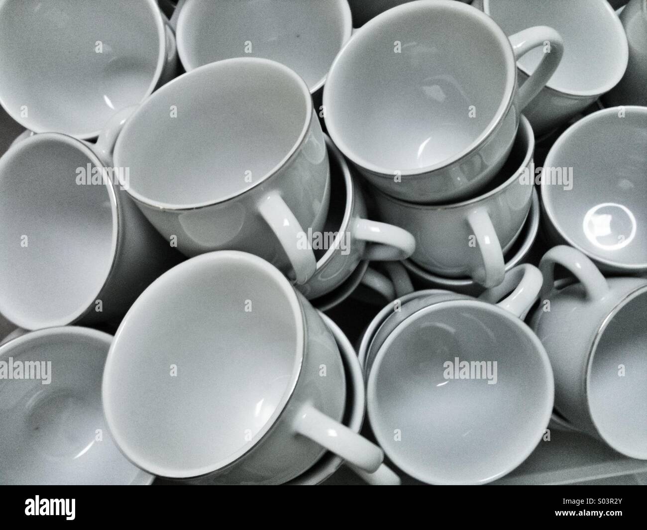 Pile of plain white cups Stock Photo