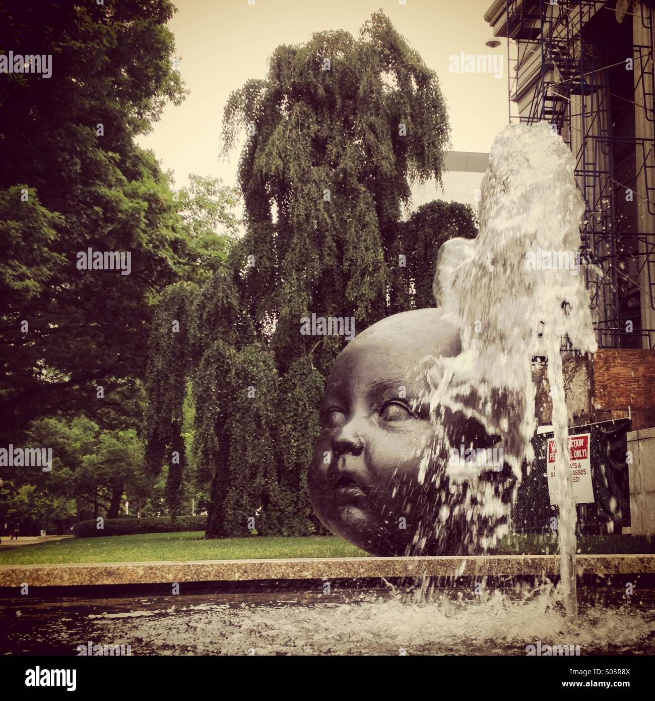 Exterior of Museum of Fine Arts in Boston showing fountain and sculpture by Antonio Lopez Garcia - Smartphone Captured Stock Image