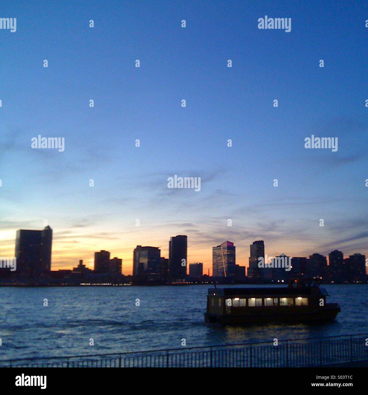 Ferry by Battery Park, Manhattan Stock Photo