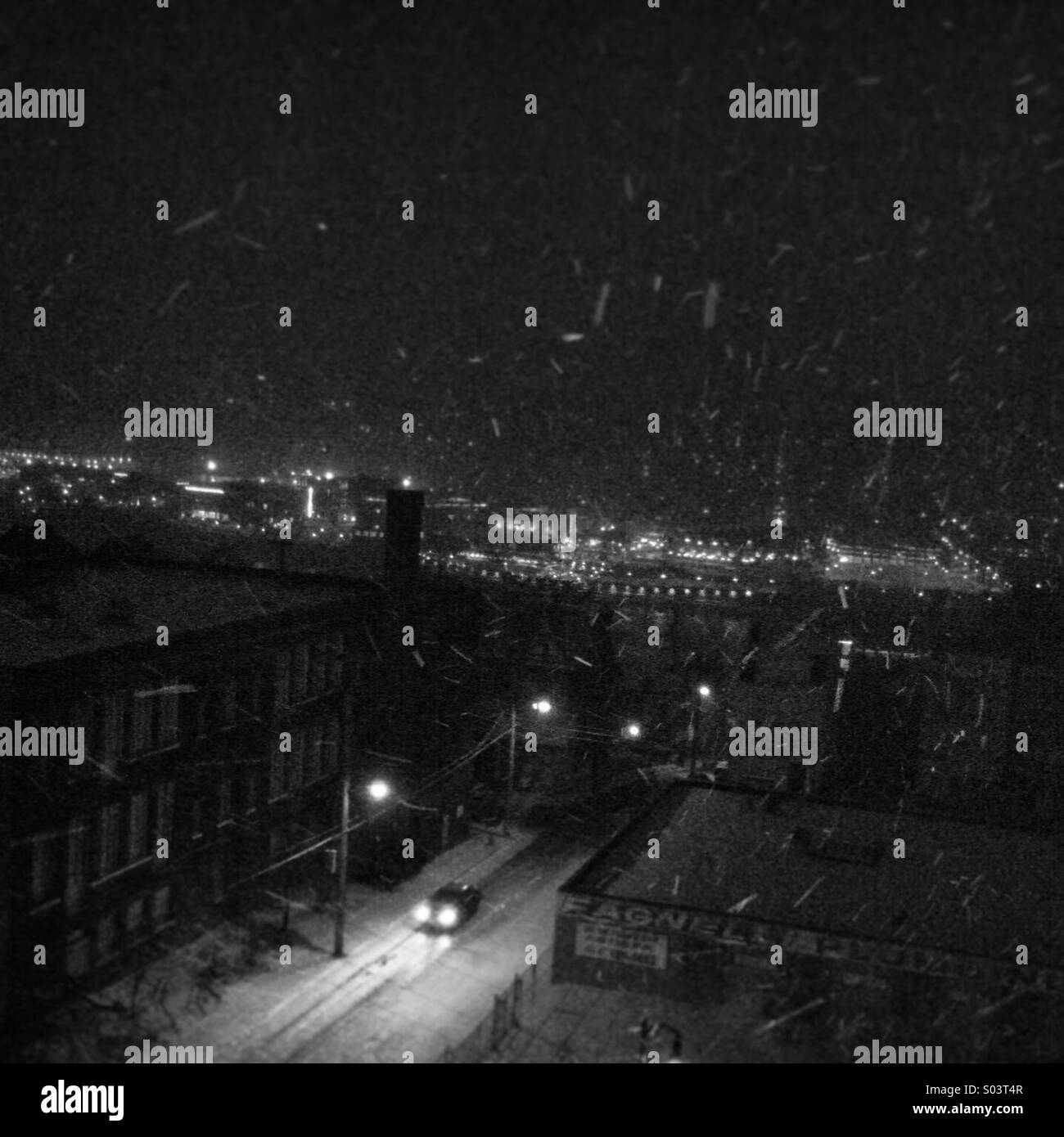 Snowing in the city Stock Photo