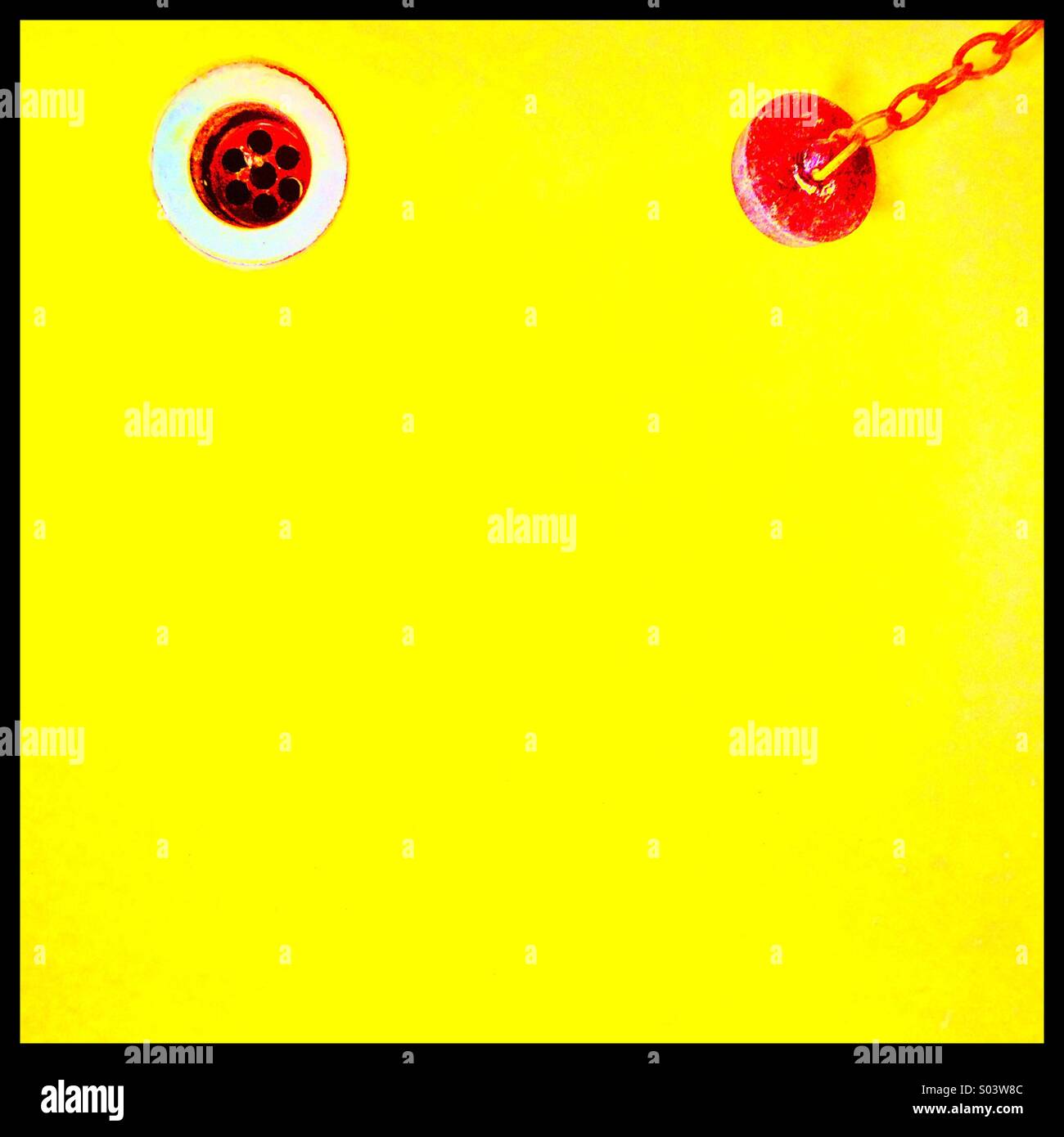 Yellow sink with plug and plughole - Smartphone Captured Stock Image