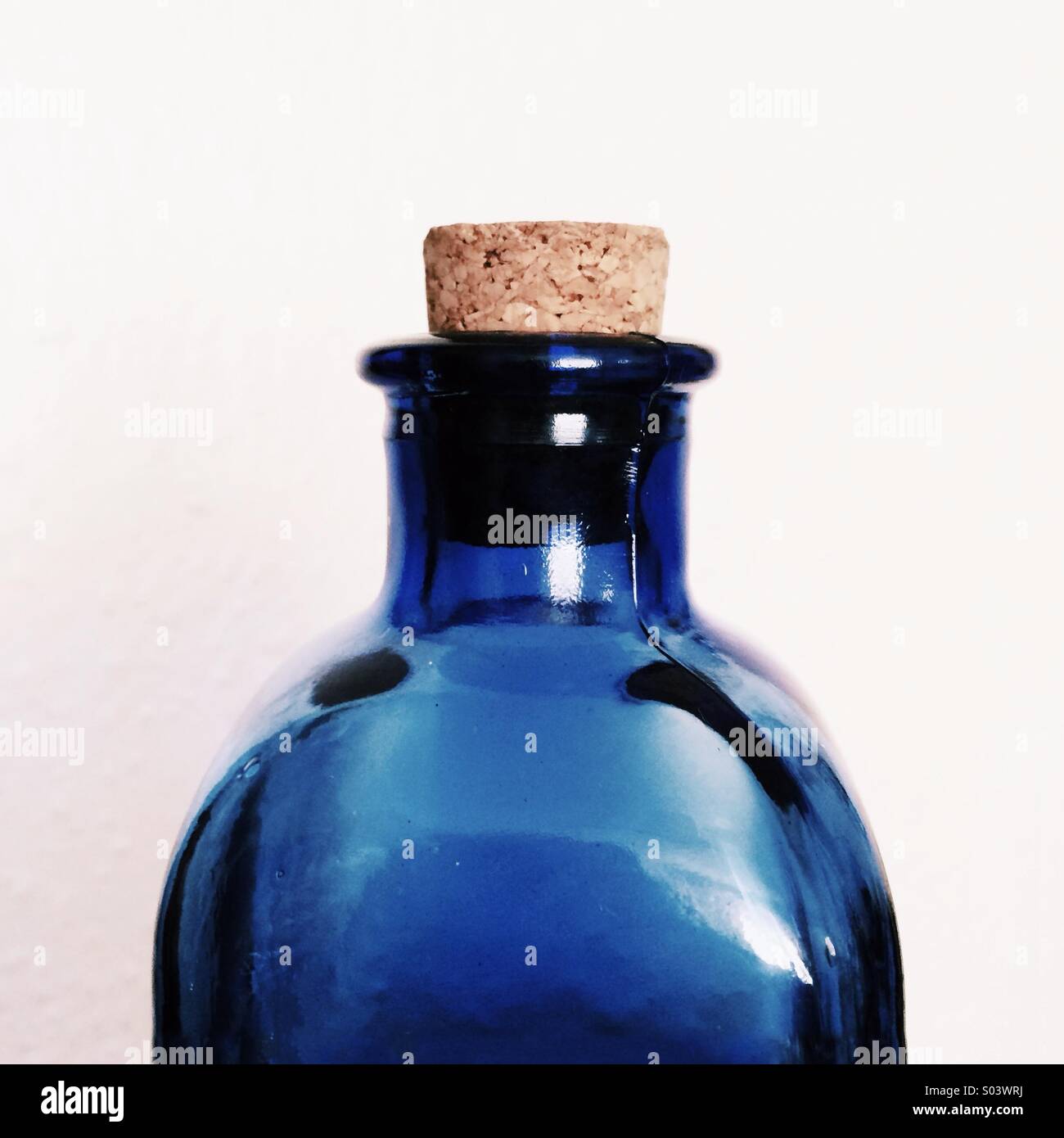 Blue glass bottle with cork Stock Photo