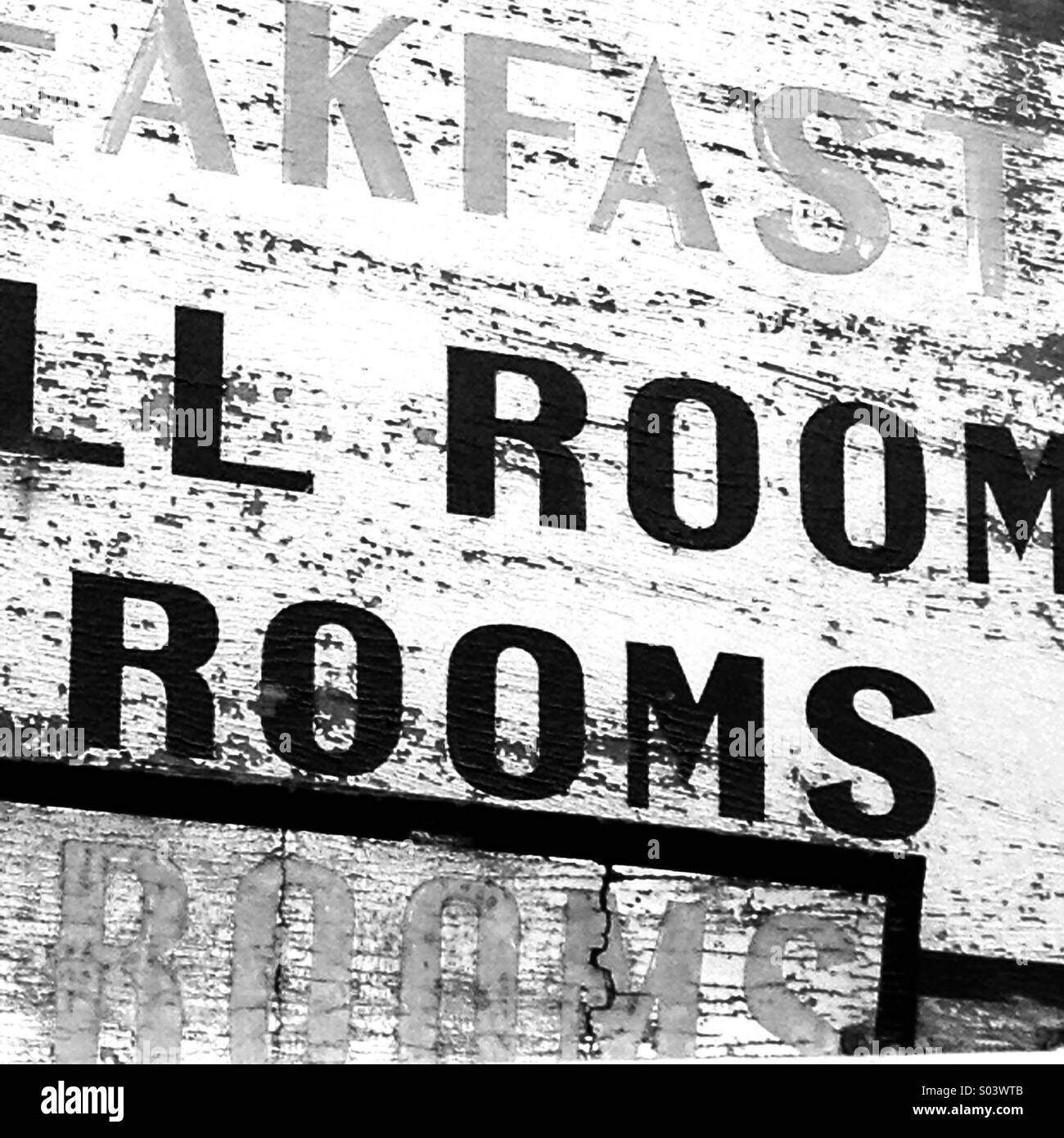 Old signage from seaside bed and breakfast place shut down - Smartphone Captured Stock Image