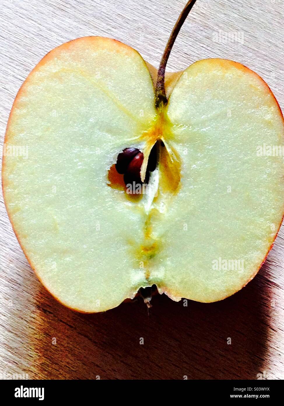 Apple cut in half Stock Photo