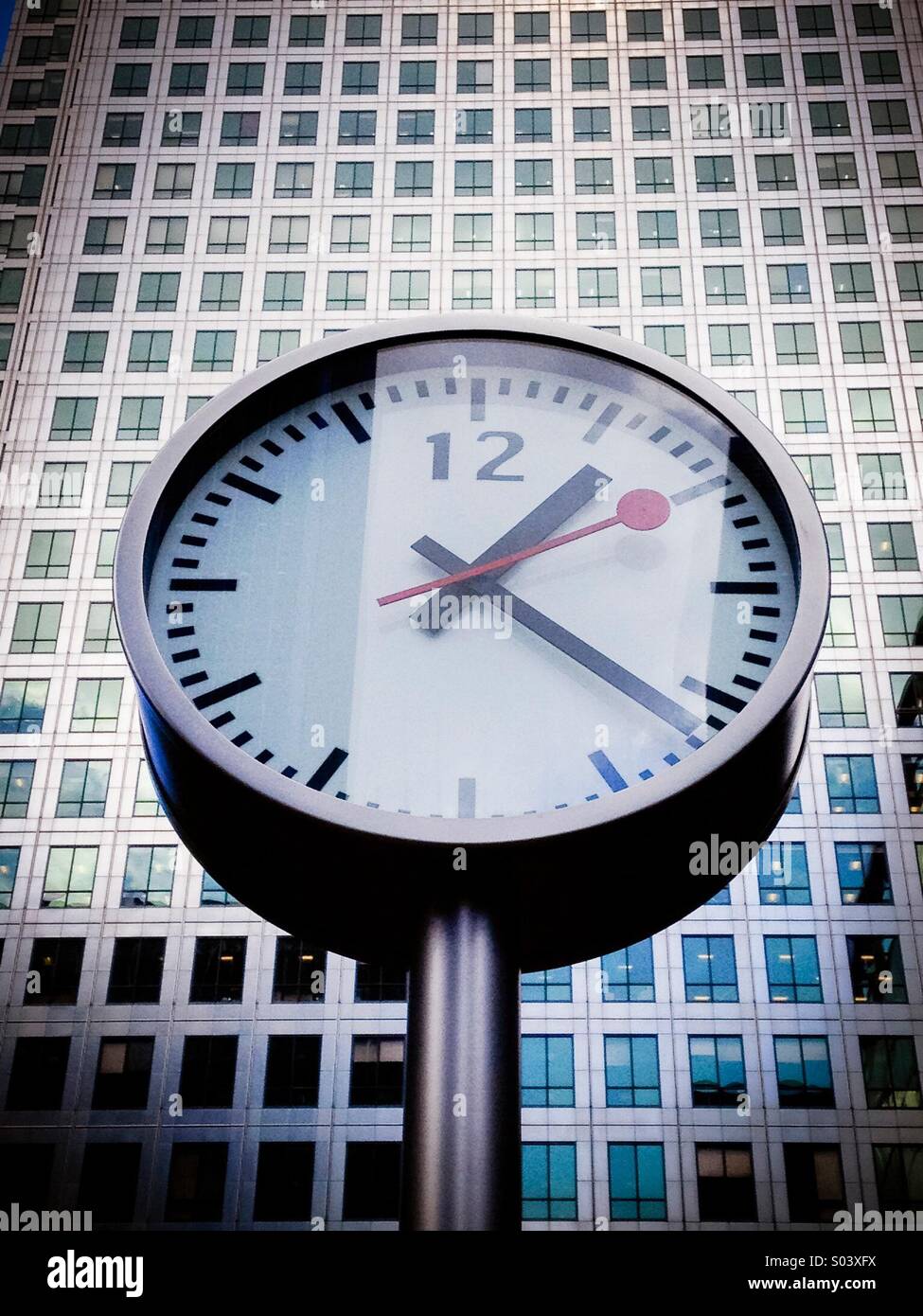 Clock at Canada Square Canary Wharf London - Smartphone Captured Stock Image