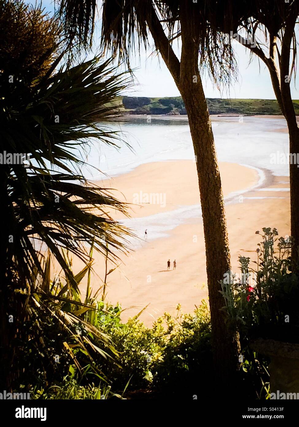 Enjoying a stroll along South Beach Tenby - Smartphone Captured Stock Image