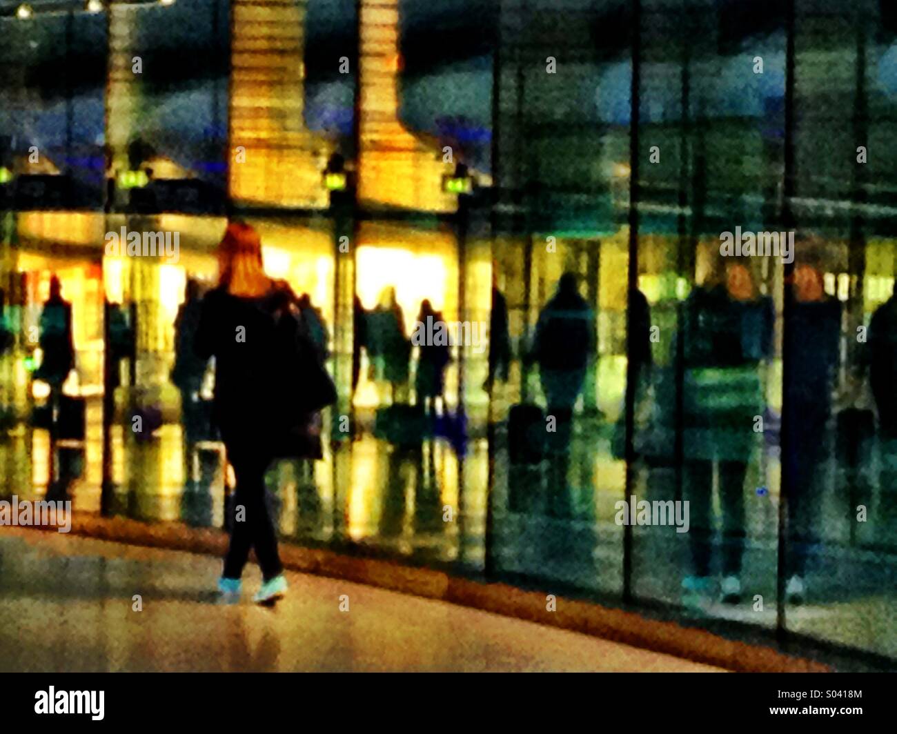 Woman Dublin airport - Smartphone Captured Stock Image