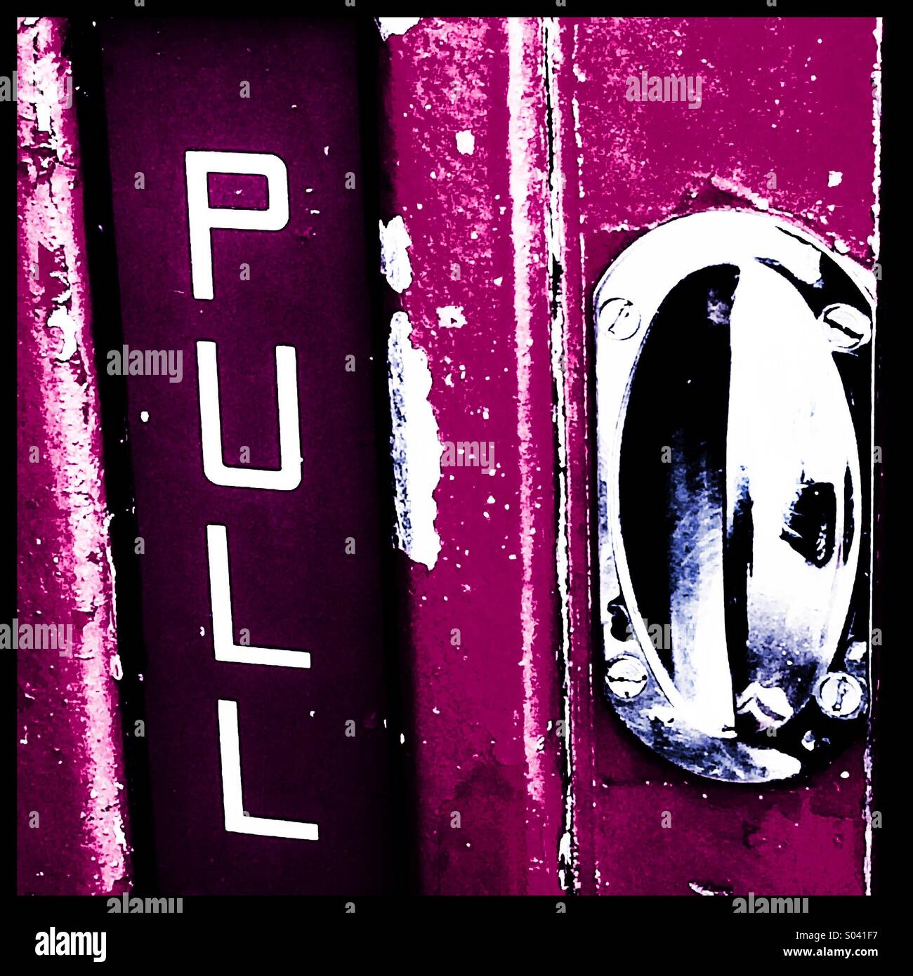 Handle and pull sign on an old phone box - Smartphone Captured Stock Image