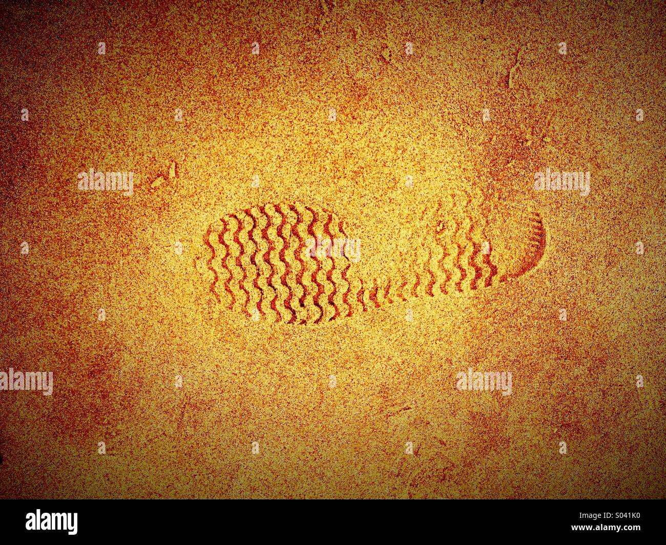 Single footprint in sand - Smartphone Captured Stock Image