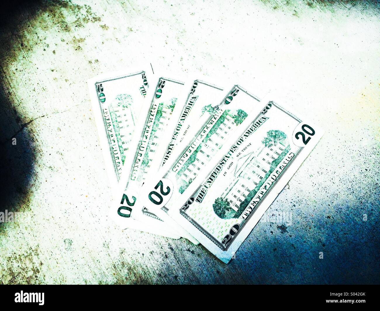 One hundred U.S. dollars in twenty dollar bills - Smartphone Captured Stock Image