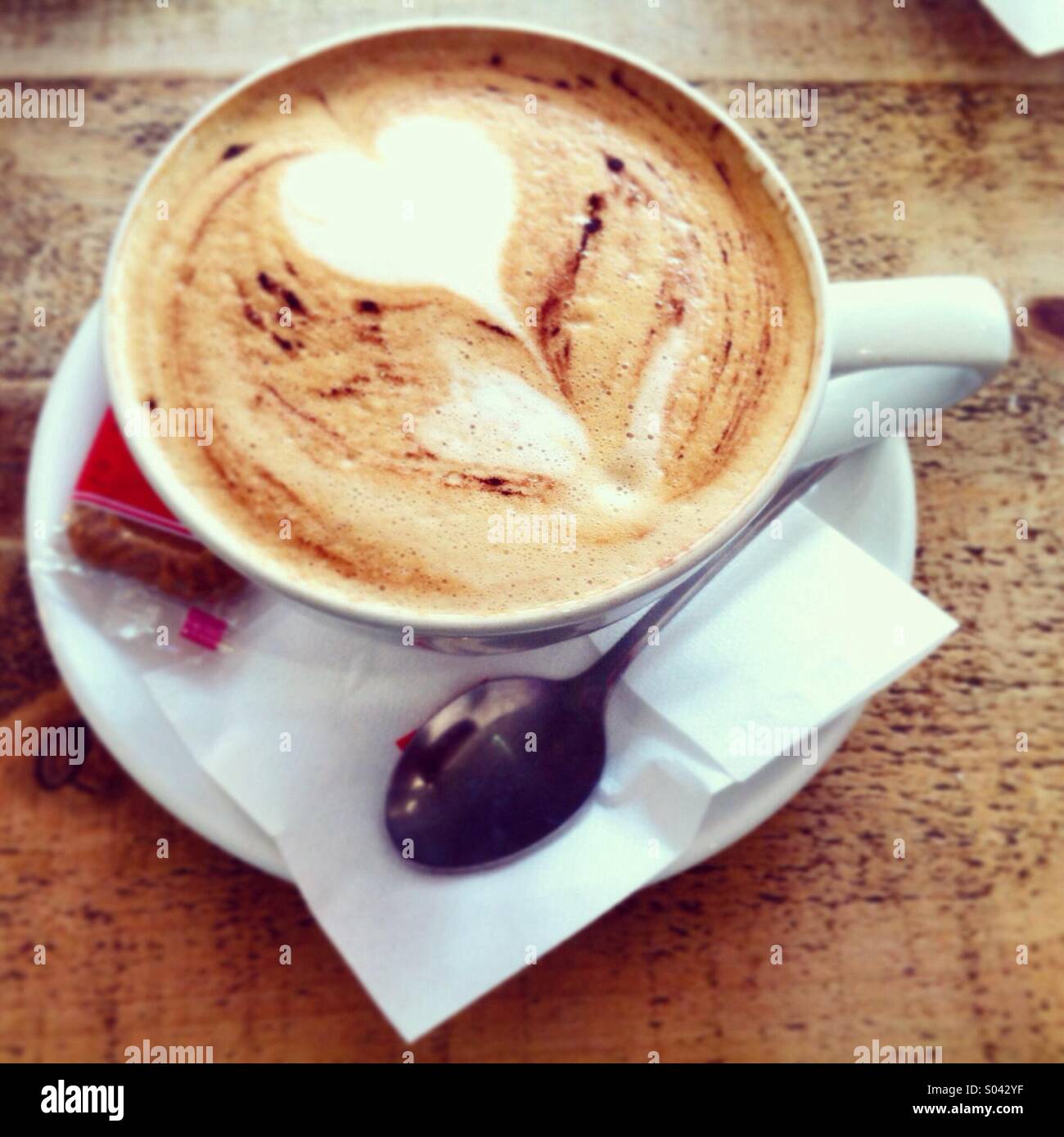 Heart shape in cappuccino froth - Smartphone Captured Stock Image