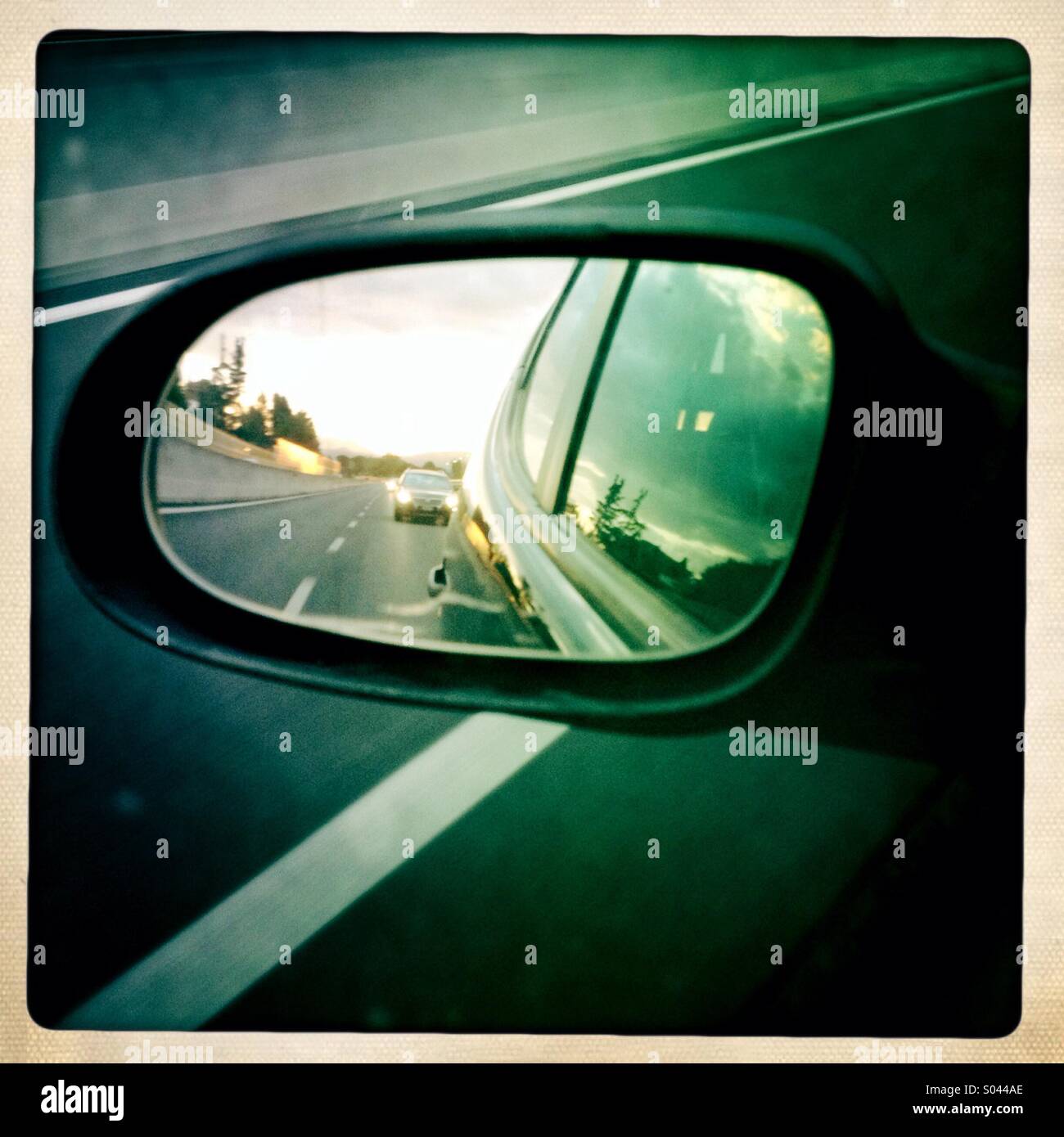 Rear view mirror whilst driving - Smartphone Captured Stock Image