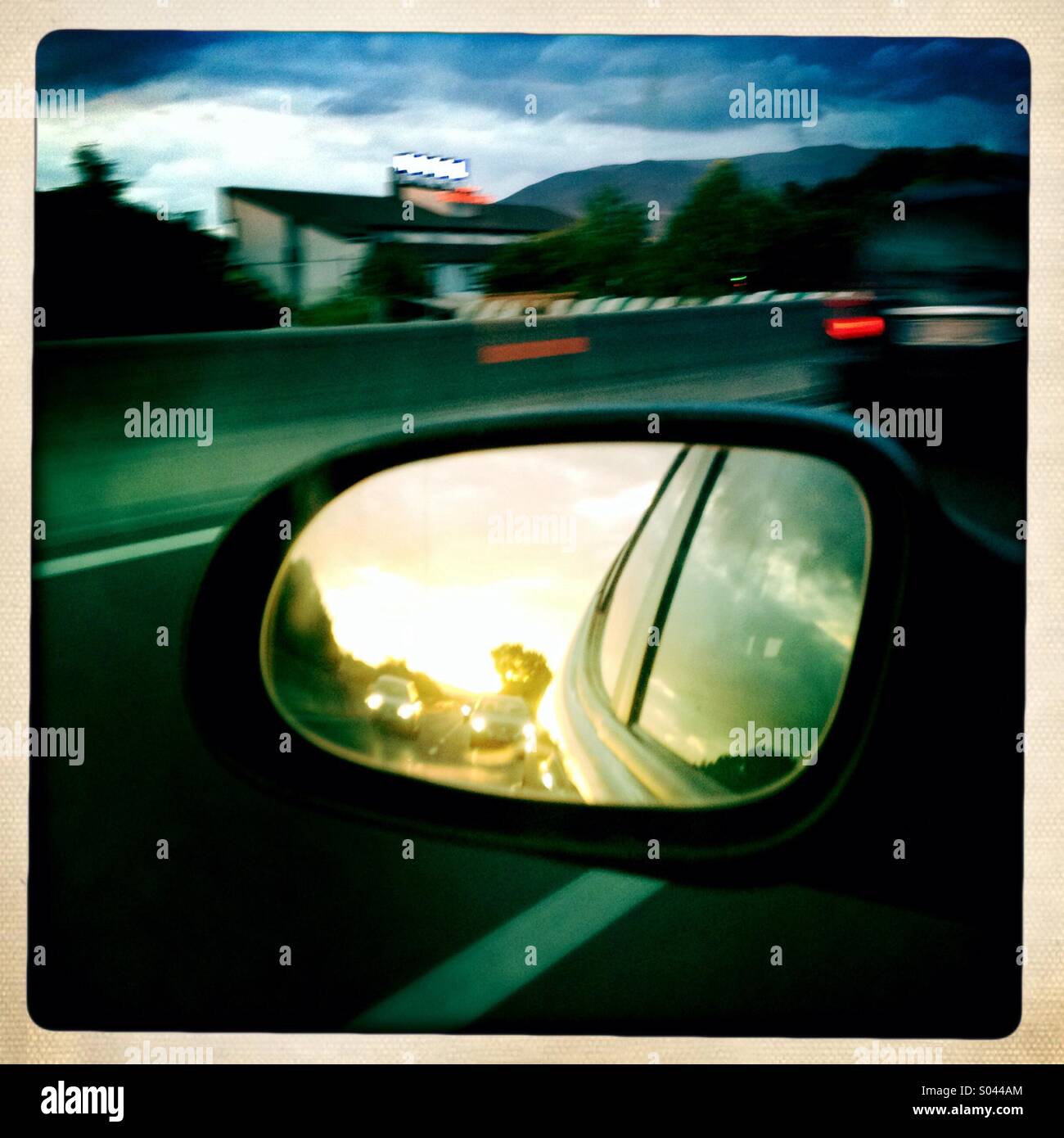 Rear view mirror whilst driving - Smartphone Captured Stock Image