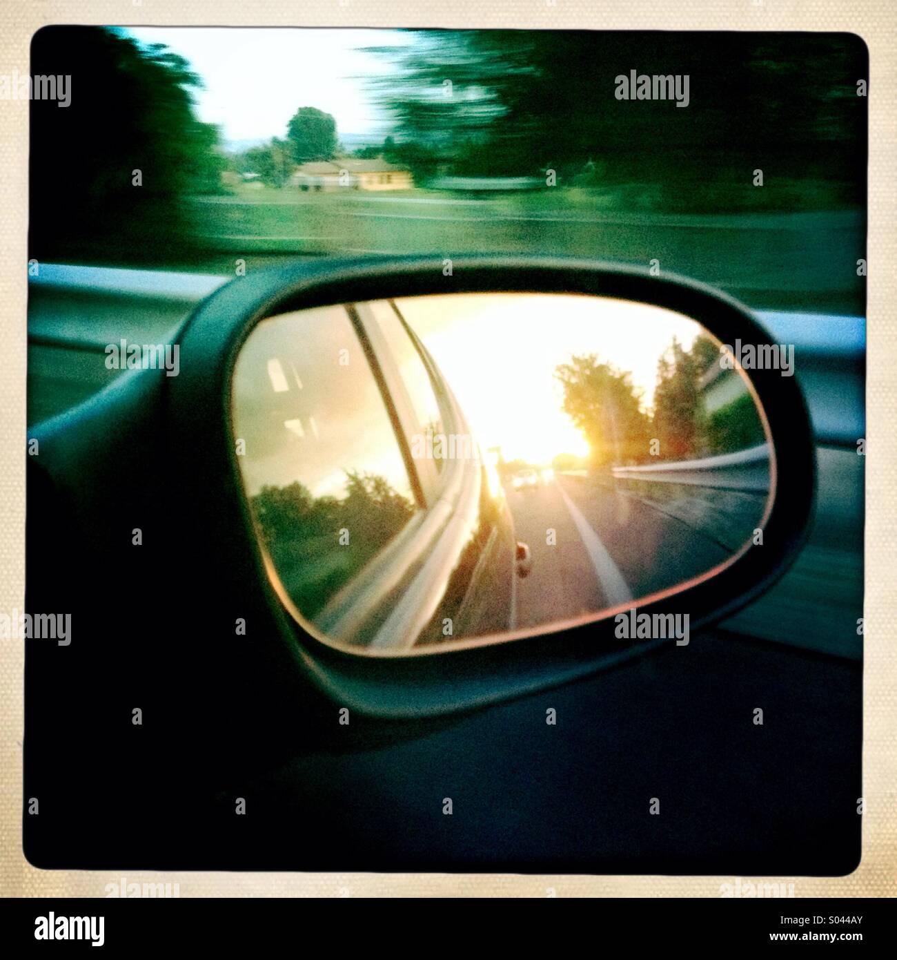 Rear view mirror whilst driving - Smartphone Captured Stock Image