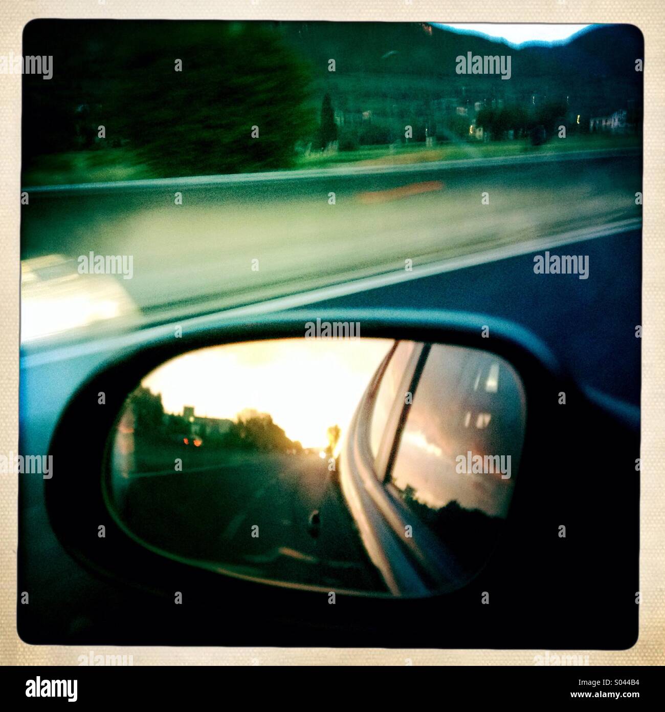 Rear view mirror whilst driving - Smartphone Captured Stock Image