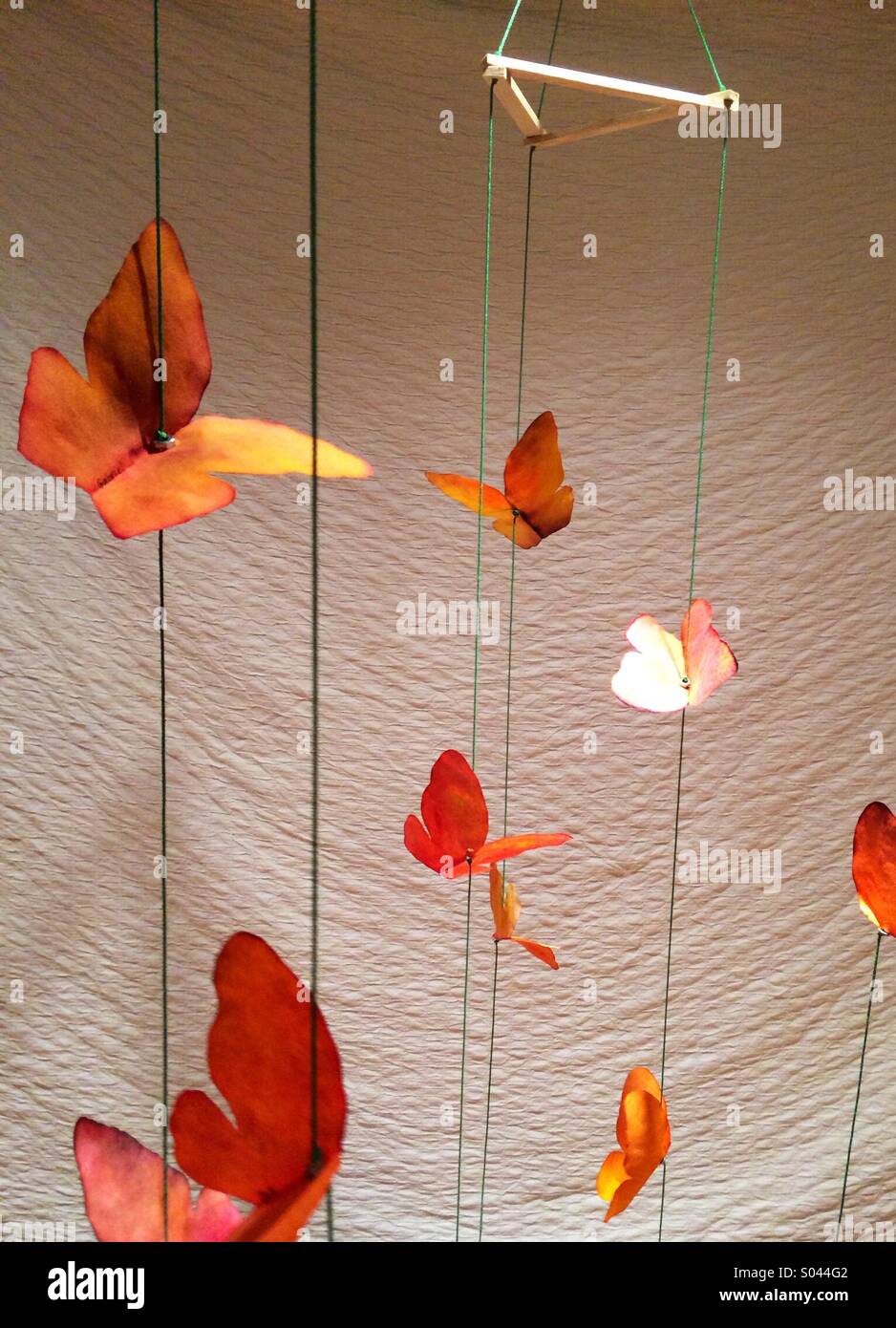 pre-school craft: a paper butterfly mobile Stock Photo