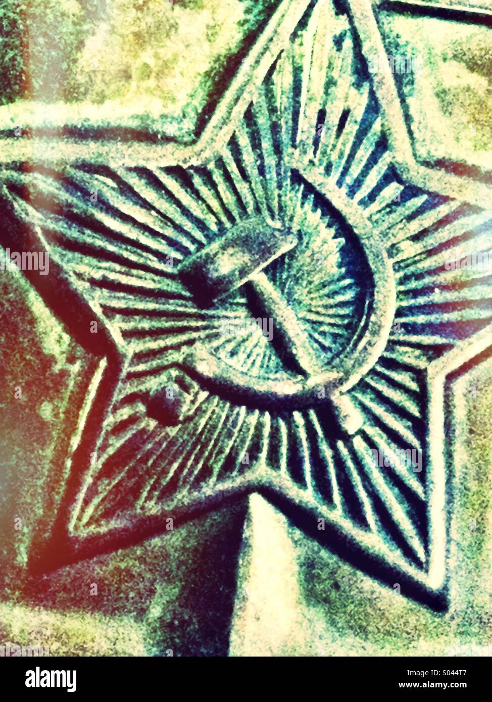 Soviet badge with hammer and sickle symbol - Smartphone Captured Stock Image