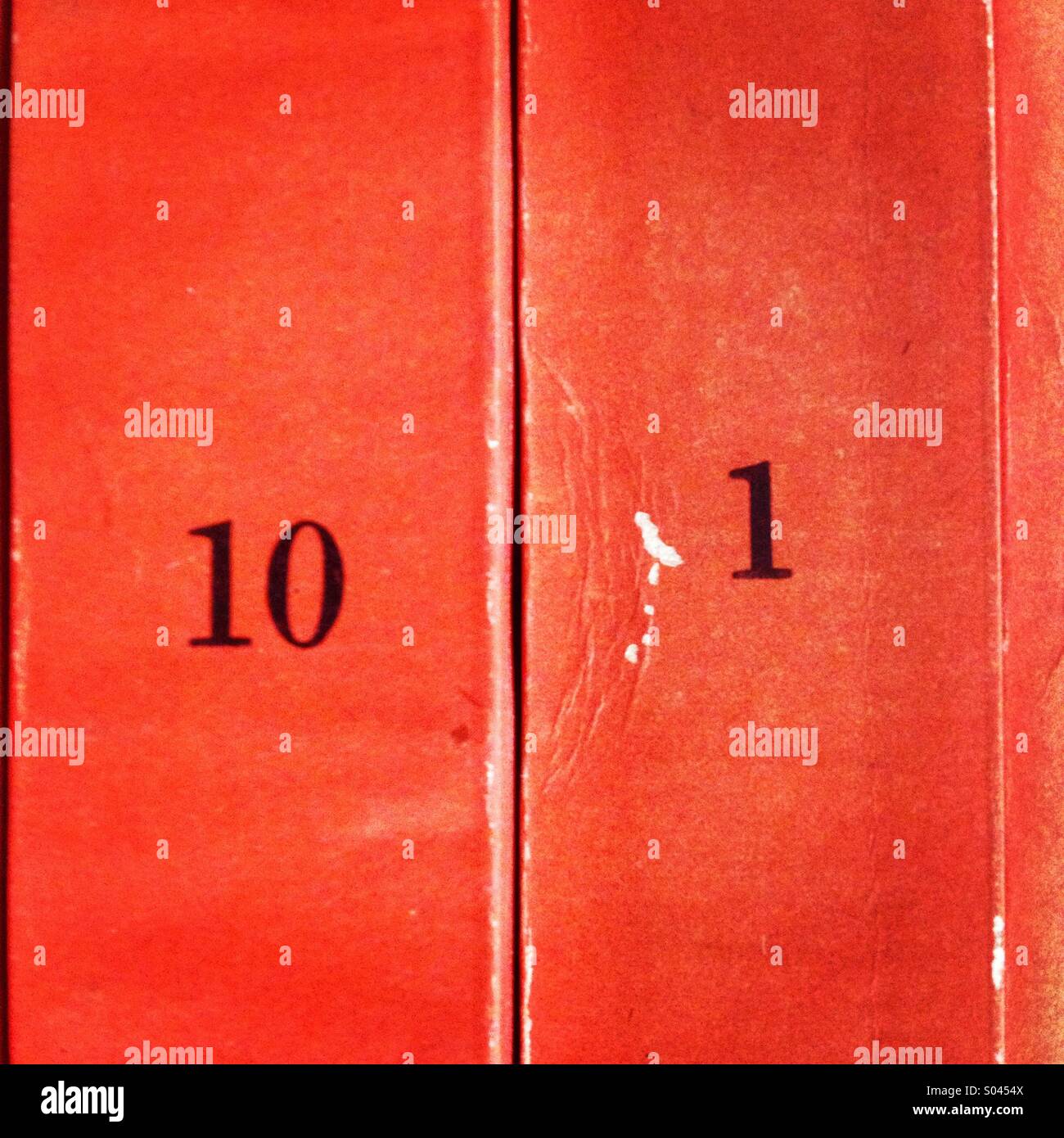 Two red books with the numbers ten and one in Librero en Andanzas used books shop in Colonia Roma, Mexico City, Mexico - Smartphone Captured Stock Image