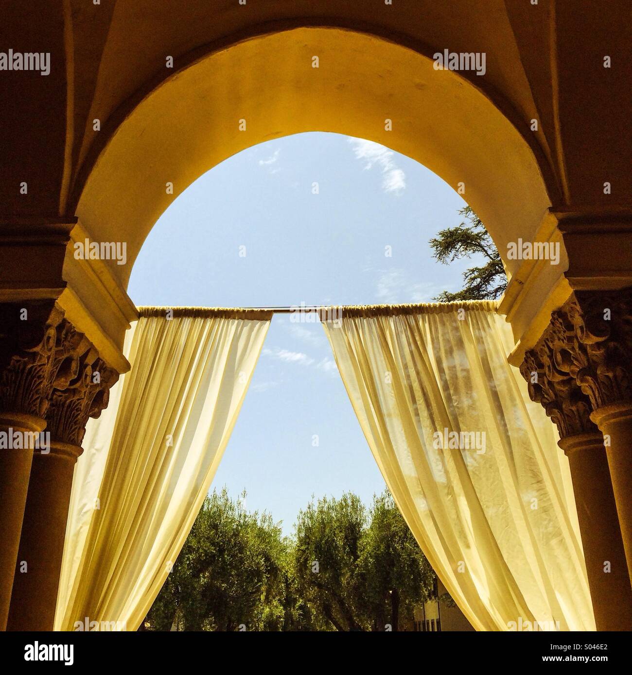 Arch with white curtain - Smartphone Captured Stock Image