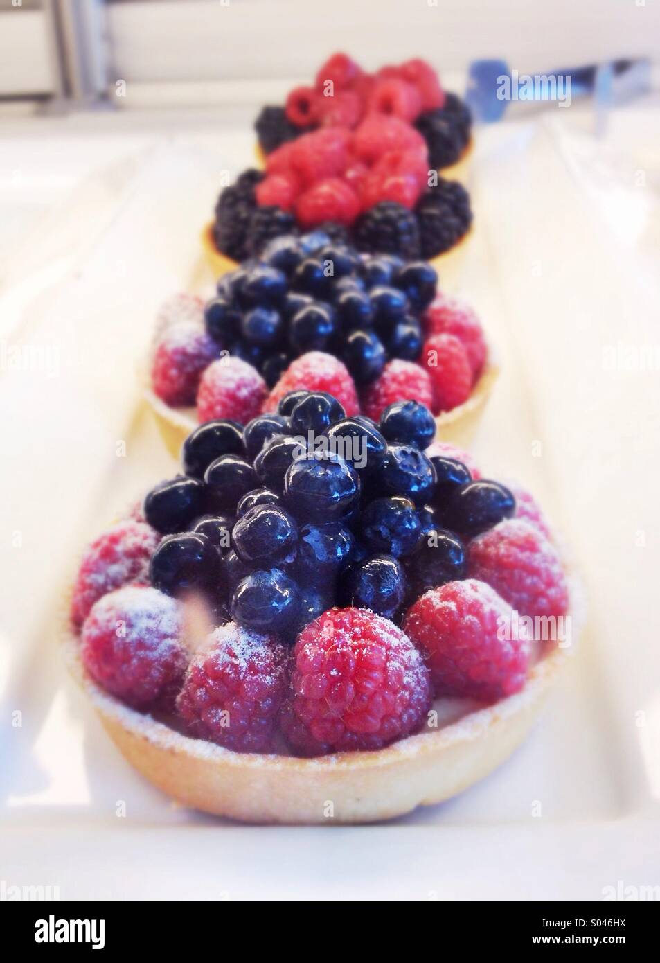 Raspberry and blueberries tart Stock Photo Alamy