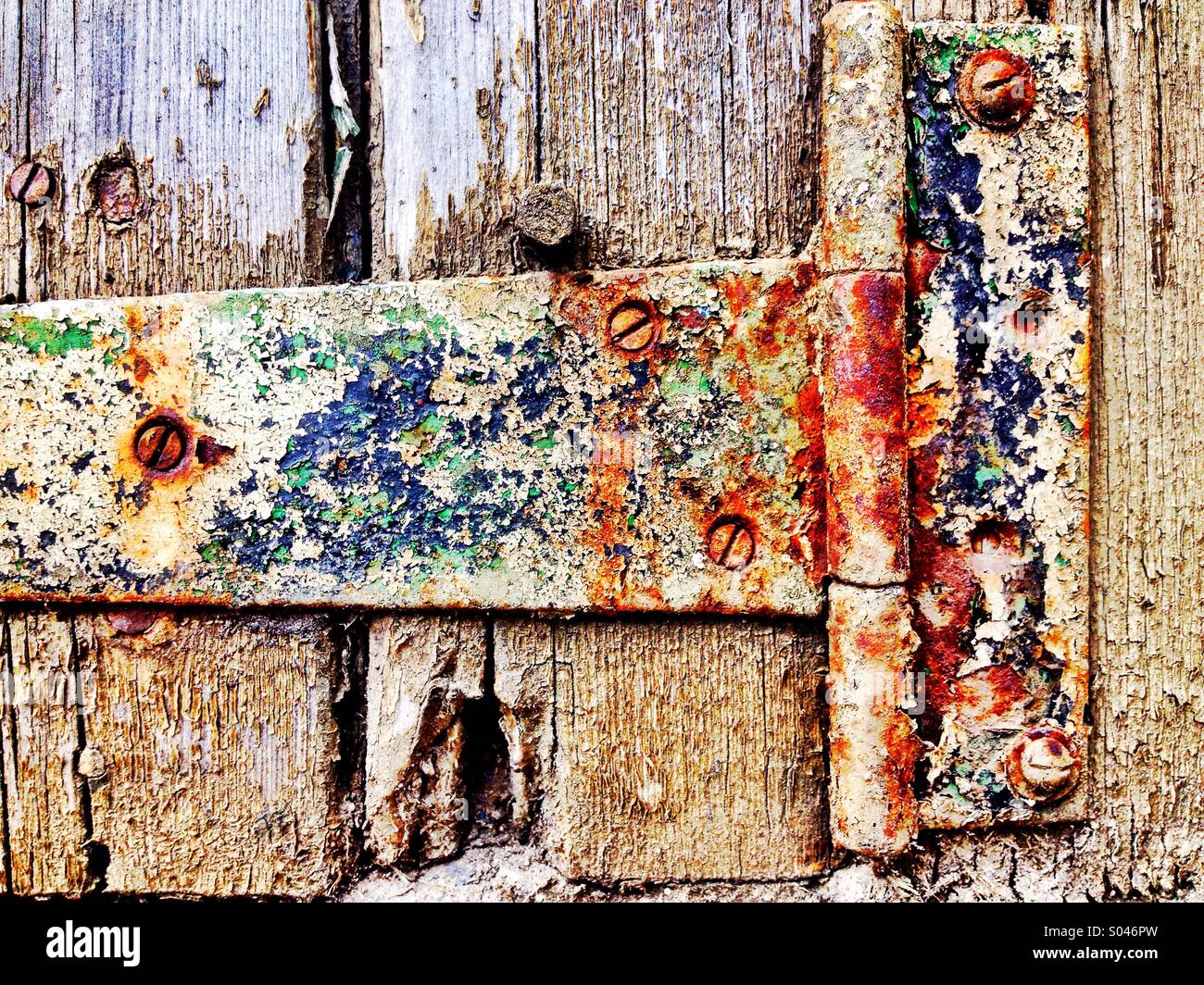 Paint on rusty hinge Stock Photo Alamy