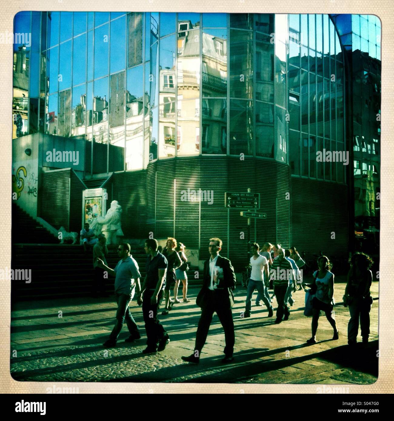 Urban street scene in central Paris at sunset - Smartphone Captured Stock Image