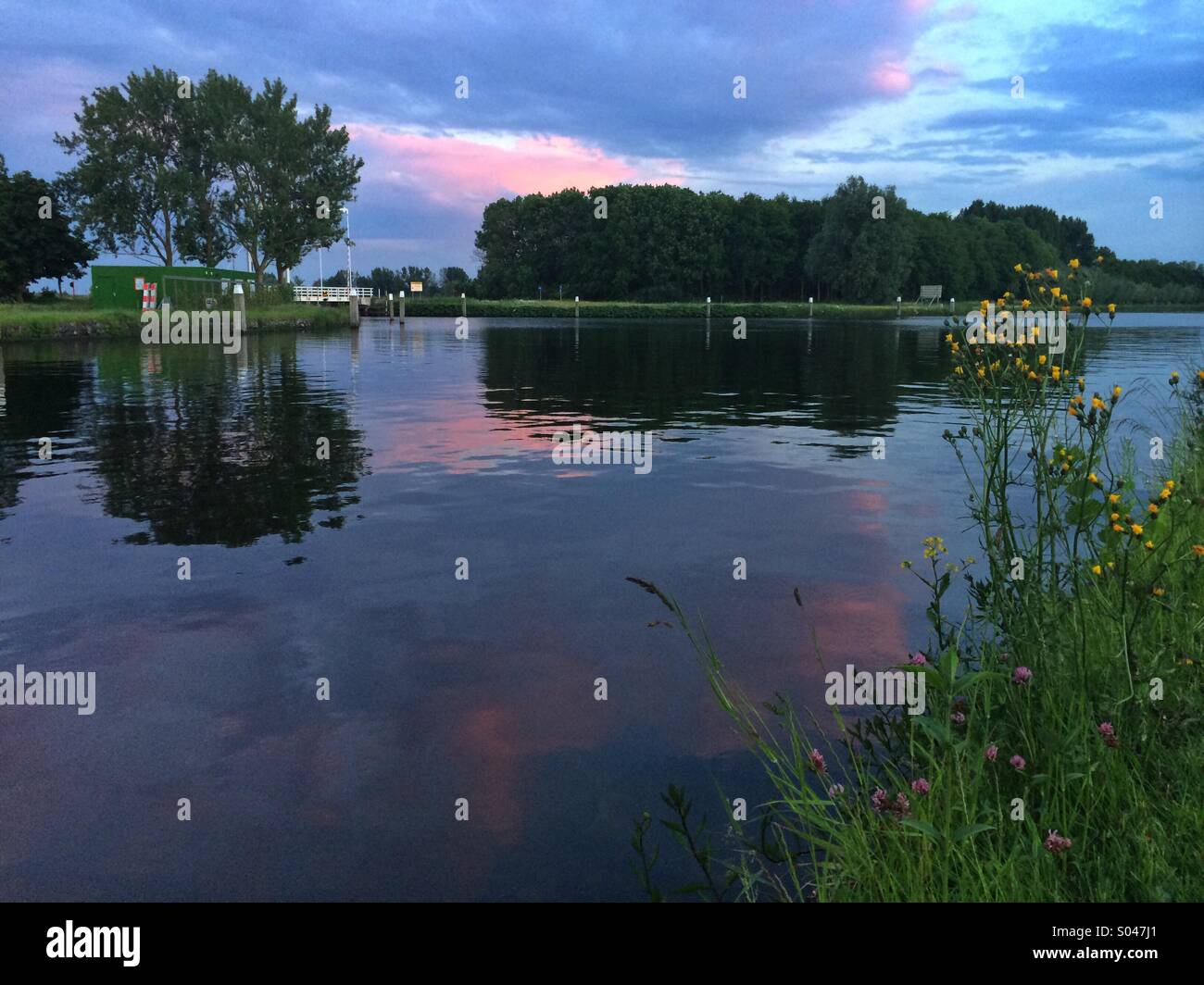 Evening light over the water Stock Photo