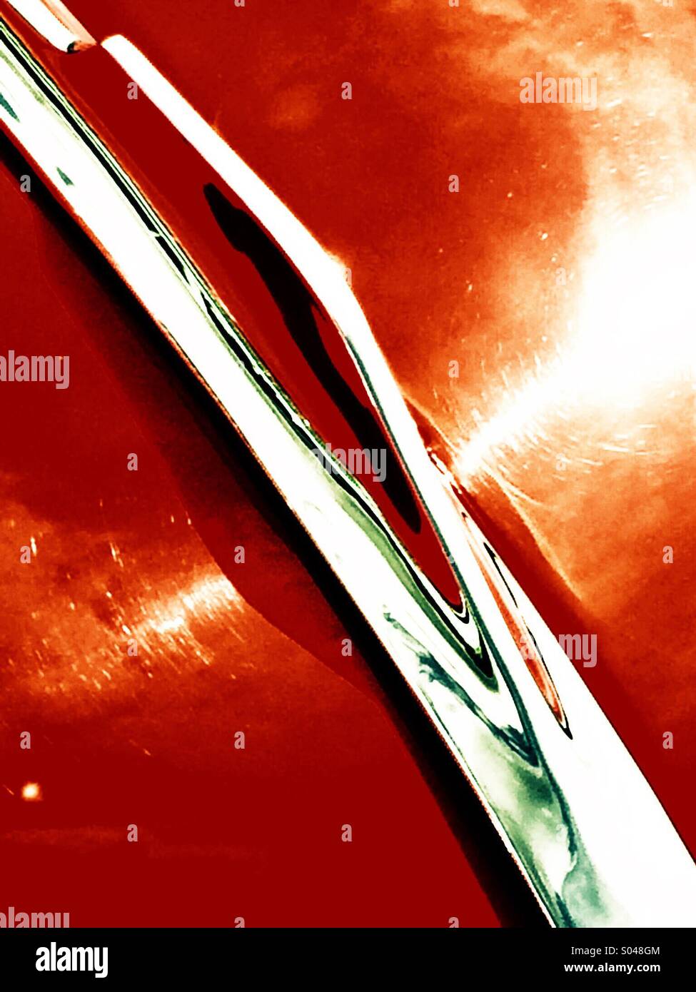 Sunlight on car chrome and paintwork - Smartphone Captured Stock Image