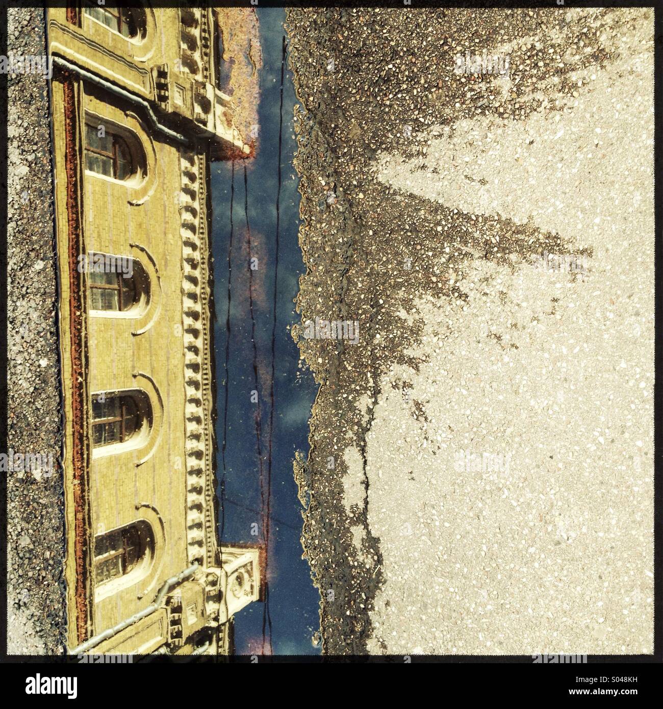 old houses reflected in a puddle on the pavement Stock Photo - Alamy