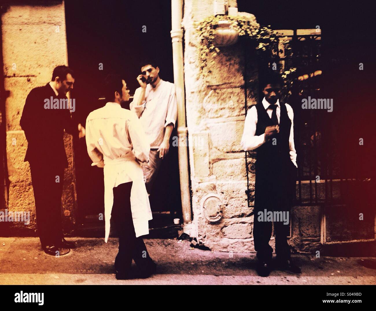 French chefs & waiters on a break - Smartphone Captured Stock Image