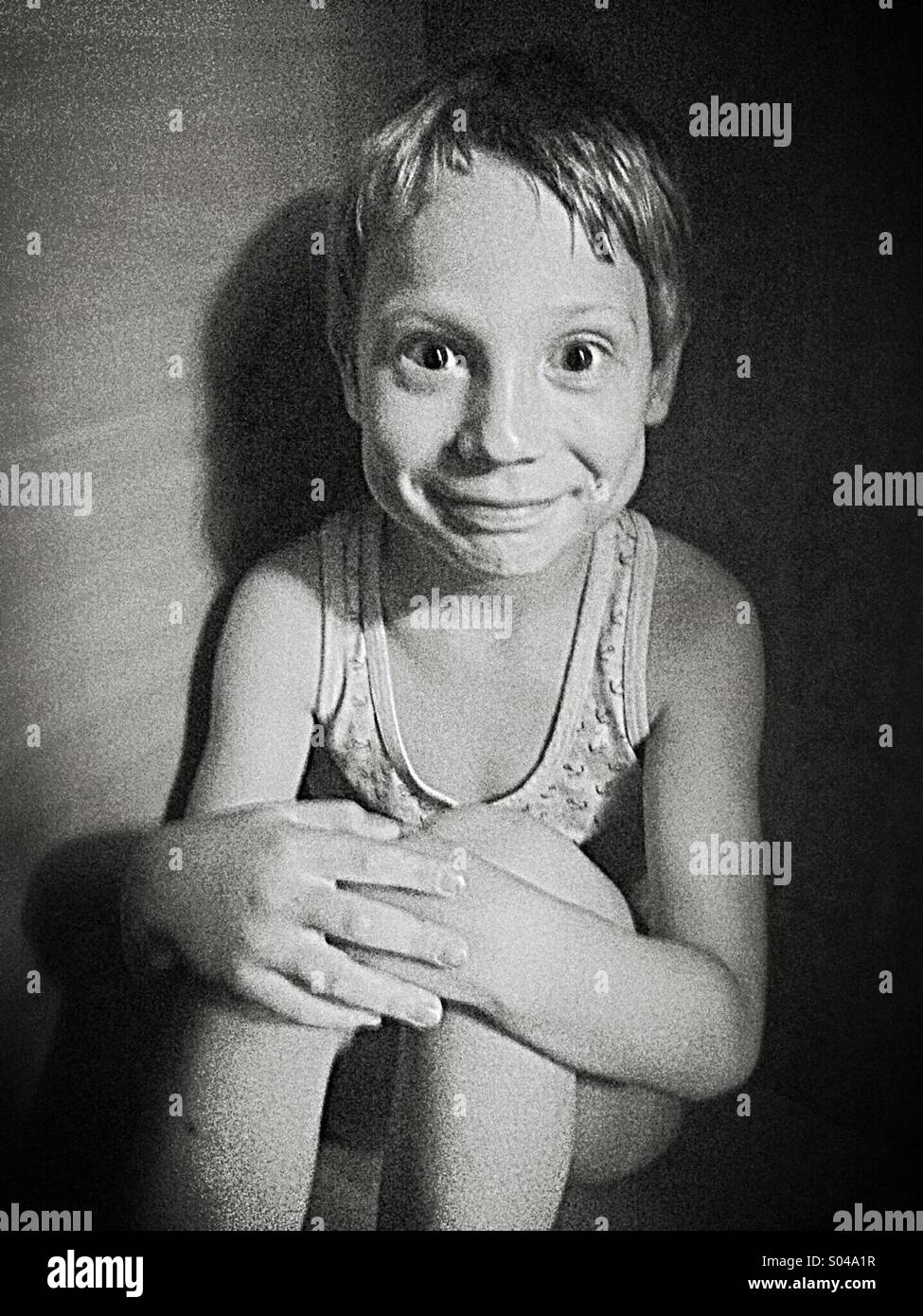 Child hiding in the closet Stock Photo Alamy