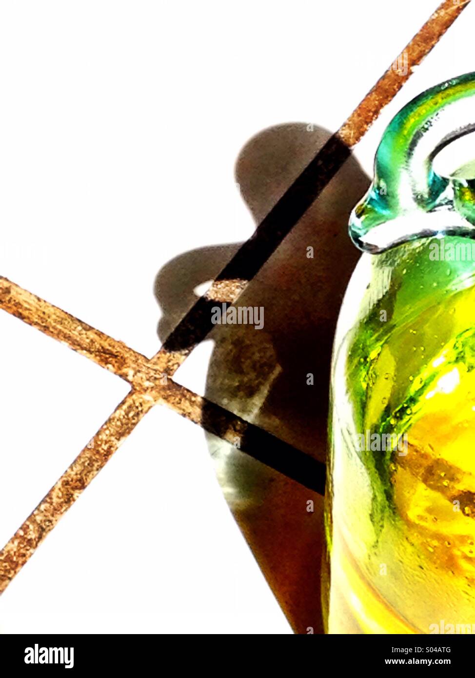 Olive oil jug and shadow - Smartphone Captured Stock Image