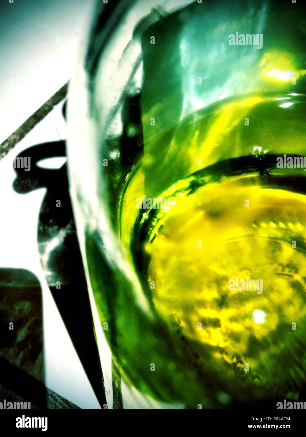 Olive oil jug shapes shadows - Smartphone Captured Stock Image