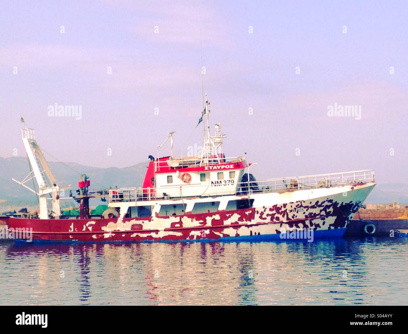 Fishing trawler in a Greek port - Smartphone Captured Stock Image