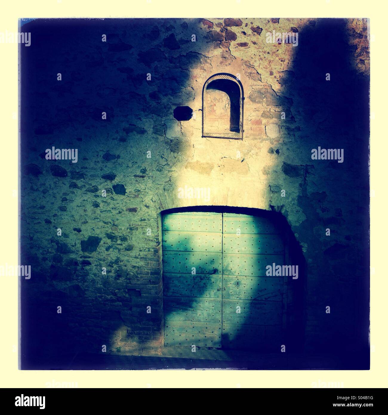 Play of light and shadows on an old house facade - Smartphone Captured Stock Image