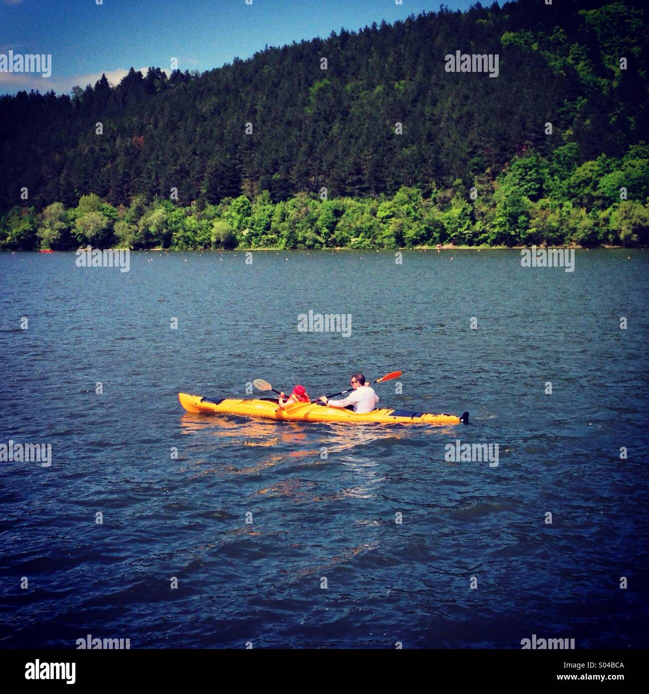 Father,son and canoes, Pancharevo lake, Sofia,Bulgaria Stock Photo