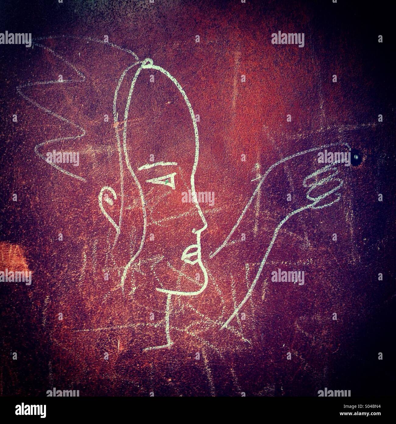 A drawing of a queen ringing a doorbell decorates a house in Colonia Roma, Mexico City, Mexico - Smartphone Captured Stock Image