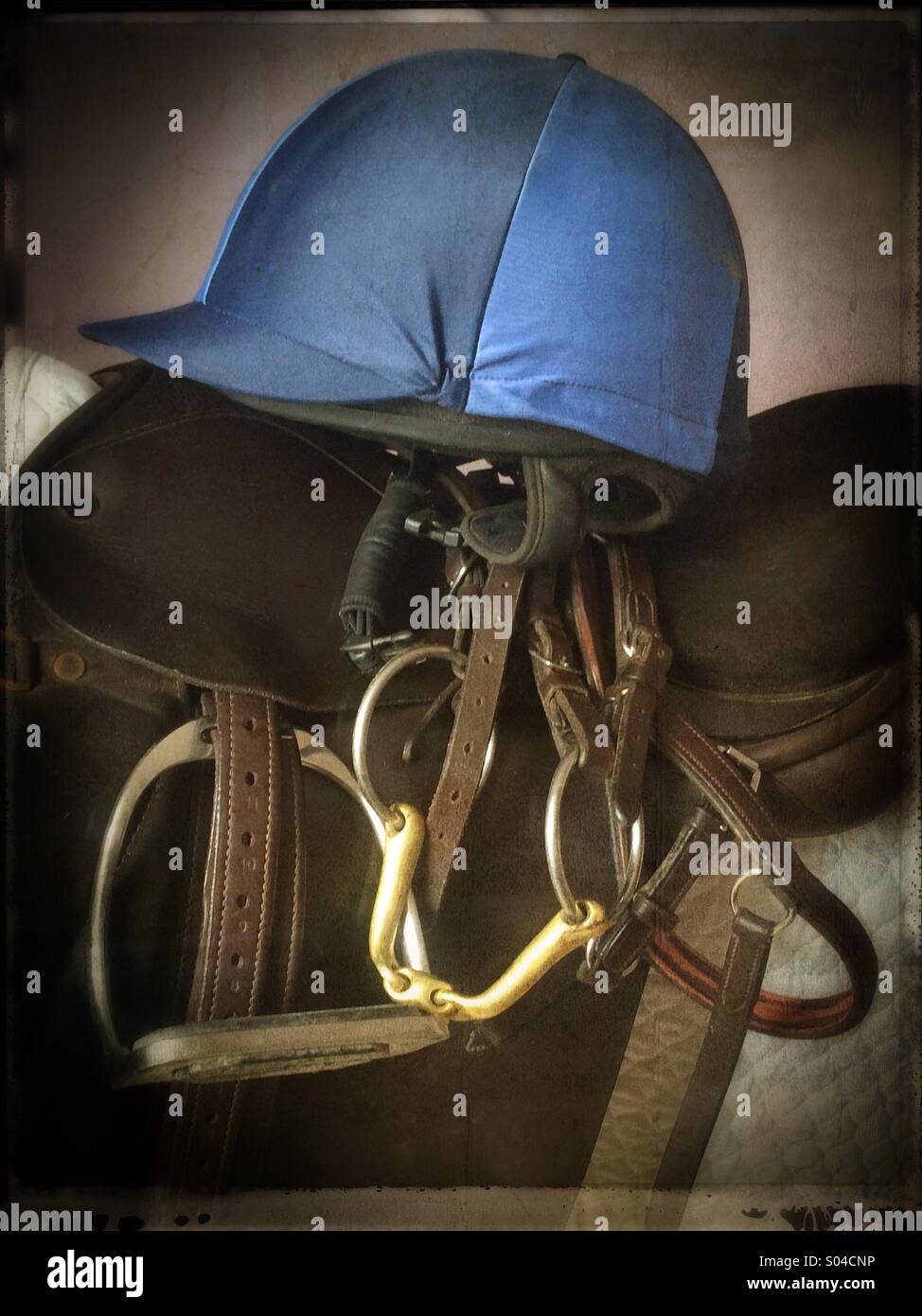 Horse riders hat saddle and bridle Stock Photo